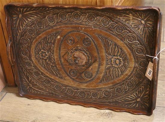 An Edwardian piano stool and carved tea tray